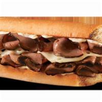 Peppercorn Steak Sub Combo · With mozzarella, sauteed onions and peppercorn sauce. Served with chips and a regular founta...