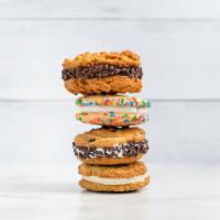 Sandwich Cookies · Our SANDWICH COOKIES are a handful. Whether it’s our signature sugar cookies with sprinkles ...