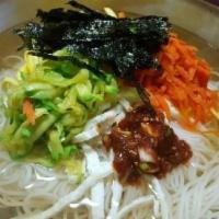 M-54E. Noodle Soup with Vegetables (잔치국수/宴会麵) · Noodle soup with fishcake, carrots, Italian squash, and egg in anchovy broth. Served hot. No...