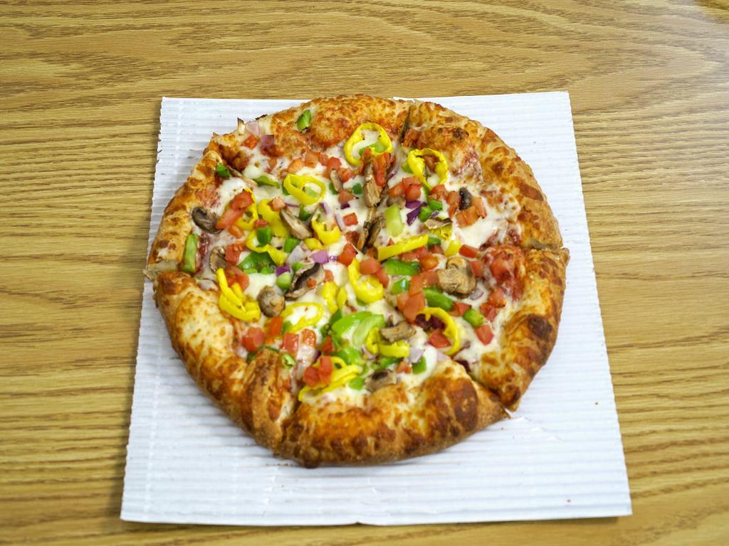 Veggie Pizza · Mushrooms, green peppers, mild pepper rings, tomatoes, onions and black olives.