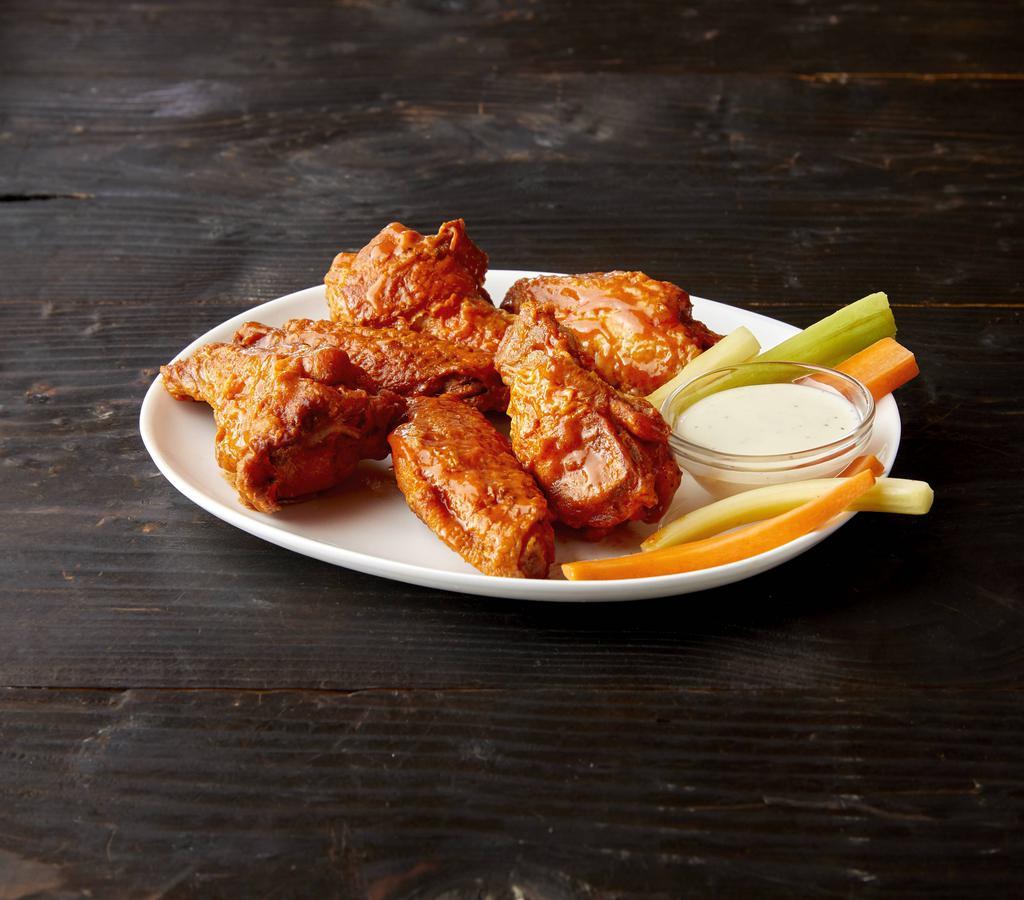 Chicken Wings · Choice of Buffalo or BBQ with carrots and ranch dressing.