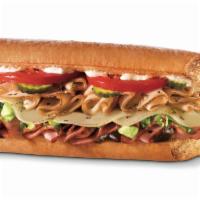 Spicy Monterey Sub · Turkey, ham, provolone, pickles, lettuce, tomatoes, mayo and 4 pepper chili sauce. Spicy.