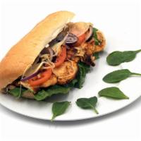 Chicken Sub · Served with Marinated Chicken, lettuce, tomato, Mayonnaise, onion and hot pepper.