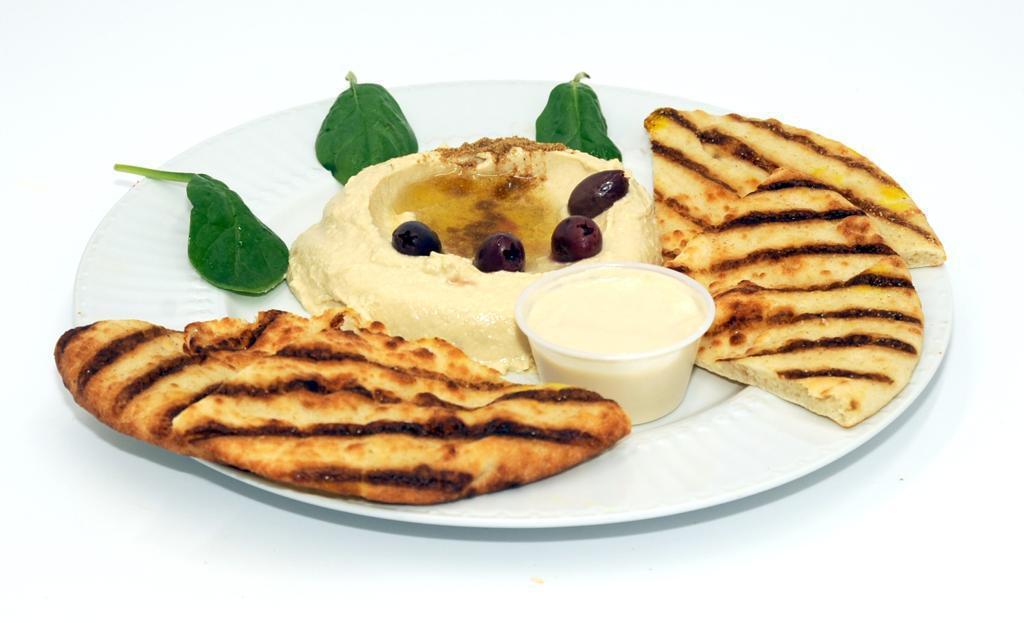 Hummus · Served on a pita, olive oil and Kalamata.