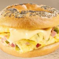Western Omelette and Cheese Sandwich · Beaten eggs that are folded over a filling. Hot sandwich filled with cheese that has been pa...