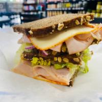 Fitness sandwich · Fitness bread , turkey , muenster cheese , mayo , lettuce , tomato ,red onion , cucumber 