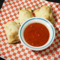 Little Devils · 3 mini calzones stuffed with Italian sausage & green chilies. Served with marinara dipping s...