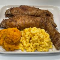 Two Jumbo Turkey Wings Platter · Oven-baked rotisserie-style. House seasoned. Very tender. Comes with two sides of your choic...