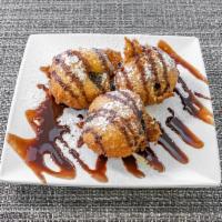 Fried Oreos · Topped with choice of chocolate or caramel.
