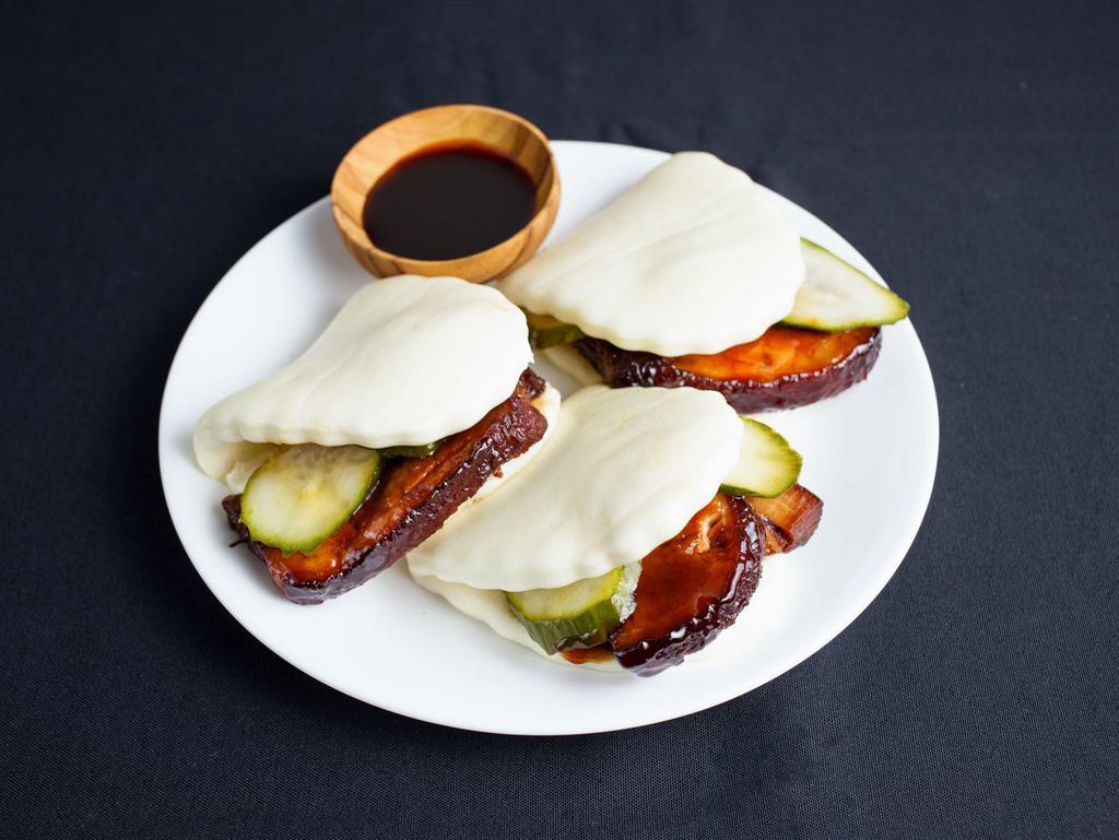 Pork Belly Baos by China Live Signatures · By China Live Signatures. 3 pieces. Chef Chen's 8-spice braised pork belly 'Gua Bao', with sliced pickled cucumber in soft steamed lotus bun. Contains gluten, sesame, dairy, and soy. We cannot make substitutions.
