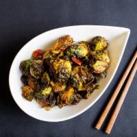 Brussel Sprouts · Caramelized brussel sprouts seasoned with curry spice and chilis. Contains nightshades. We c...