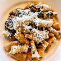 Truffle Pasta · Porcini Mushrooms, Truffle Butter, Soft Herbs, Creme Fraiche