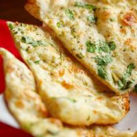Garlic Basil Naan · Flatbread topped with garlic and basil chefs recommendation.