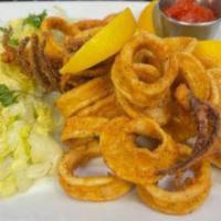 Onion Rings · Fried battered onion with ranch.