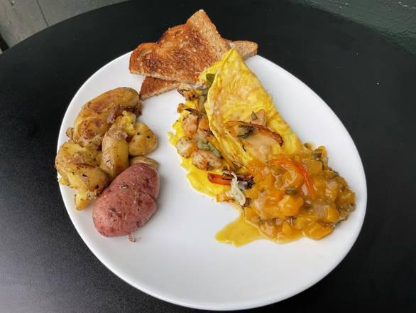 Atlanta Omelette · Stuffed With Lemon Grass Marinated Shrimp, Chives, Tarragon, Shallots and Garlic. Topped with a Jalapeno Peach Jam.