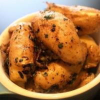 Potatoes · Side of Seasoned Breakfast Fingerling Potatoes served with our signature chive creme sauce
