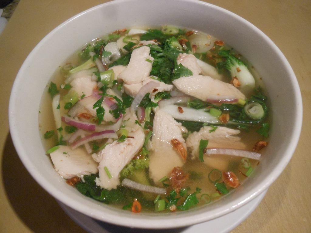Pho Chicken · Rice noodle soup with baby bok choy ,brocolli  and chicken breast.  