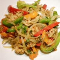 Stir-Fried Vegan Chicken · Wok-fried with lemongrass, bell peppers and onions.