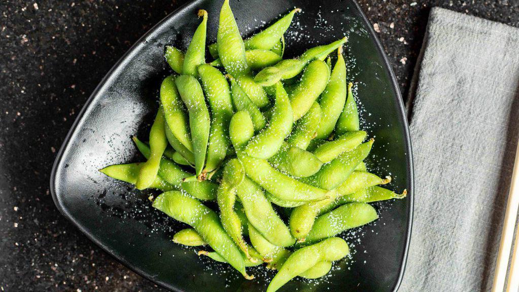 Edamame  · Steamed and lightly salted young soybeans.