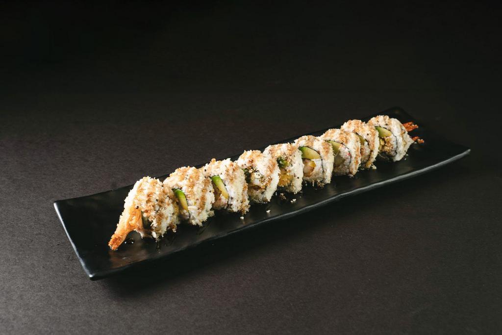 Crunch Roll · Shrimp tempura, crab salad and avocado topped with crunch flakes and unagi sauce.