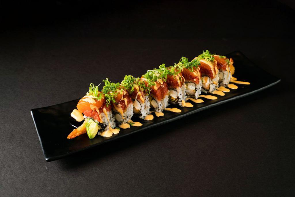 Red Philly Roll · Shrimp tempura, cream cheese and avocado topped with spicy tuna, salmon drizzled spicy mayo, unagi sauce and hot sauce.