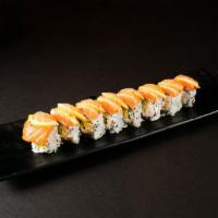 Salmon Ceviche Roll · Crab salad, avocado and cucumber topped with salmon, lemon and Japanese mustard sauce.
