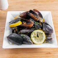 Mussels · Sauteed in a white wine sauce with fresh garlic and lemon juice.