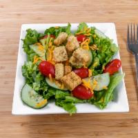 Garden Salad · Lettuce, fresh vegetables, cheese, and garlic croutons.