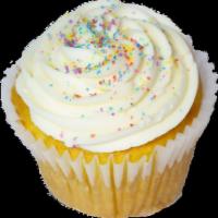 French Vanilla Cupcake · Vanilla cupcake topped with our signature french vanilla buttercream and colored sugar.
