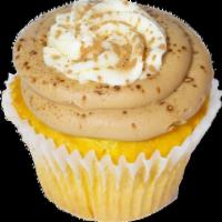 Mama Mia Cupcake · A vanilla cupcake topped with alternating layers of mocha buttercream and cream cheese icing...