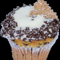 Cannoli Cupcake · A chocolate-chip vanilla cupcake, topped with our chocolate-chip cannoli buttercream, dusted...