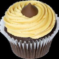Peanut Butter Kiss Cupcake · Chocolate cupcake topped with a layer of smooth semisweet chocolate, a peanut butter butterc...