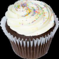Vanilla Creme de Cocoa Cupcake · Chocolate cupcake topped with our signature french vanilla buttercream and sugar.