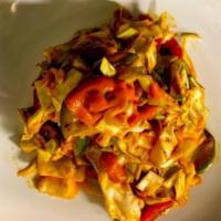 Curry Cabbage Salad · Marinated cabbage, curry sauce, carrots, fresh thyme and peppers
