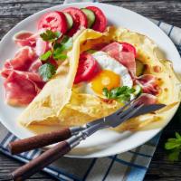 Breakfast Crepe · Organic ham, organic egg, organic tomato, organic onion, dill, cilantro.