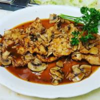 Chicken Marsala · Served with mushrooms and side pasta. Your choice pasta spaghetti, ziti, linguini, angel hai...