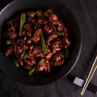 Mongolian Chicken · Sweet soy glaze, garlic, snipped green onion