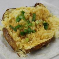 2. The Classic Baked Potato · Our giant russet potato hot and fluffy served with butter, sour cream and green onions. Serv...