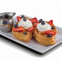 Berry Bo Berry · Traditional waffle, blackberries, strawberries, raspberries, blueberries, topped with whippe...