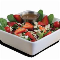 Spinach Strawberry Salad · Bed of spinach topped with feta cheese, strawberries, dried cranberries and slivered almonds...