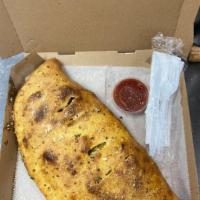 Deluxe Calzone · Pepperoni, sausage, onion, green pepper.