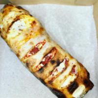 Stromboli · Sausage, pepperoni, onions, green peppers, and mozzarella cheese, rolled inside a pizza crus...