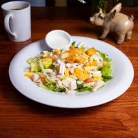 Chef's Salad · Chopped turkey, cheddar and pepper jack cheeses, onions, tomatoes, cucumber, hard-boiled egg...