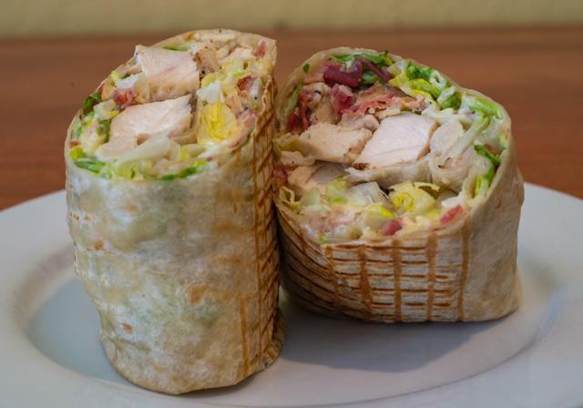 Chicken Bacon Caesar Wrap · Romaine, Provolone cheese and Caesar dressing in a tortilla.