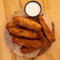 Fried Pickles · Hand-Breaded Fried Pickle Spears Served With Ranch Dressing.
