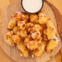 Fresh Battered Cheese Curds · Ellsworth Cheese Curds Battered In-House & Fried To Order. Served With Ranch Dressing.