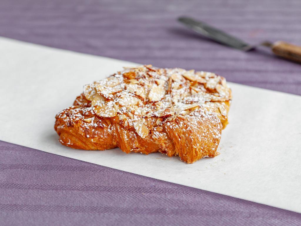 Twice Baked Almond Croissant · Twice baked croissants are	our most decadent croissants. Based on	a butter croissant that has been cut in half, toasted and brushed with a light vanilla syrup, it is then filled with almond frangipane, topped with almond frangipane and sliced almonds and baked again. The result is an almond croissant that is crisper on the outside, tender on the inside, and nutty all around!