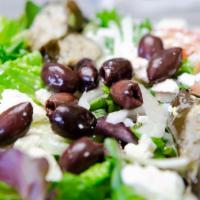 Greek Salad · Romaine lettuce, tomato, onion, cucumber, olive, stuffed grape leaf, feta, olive oil and vin...