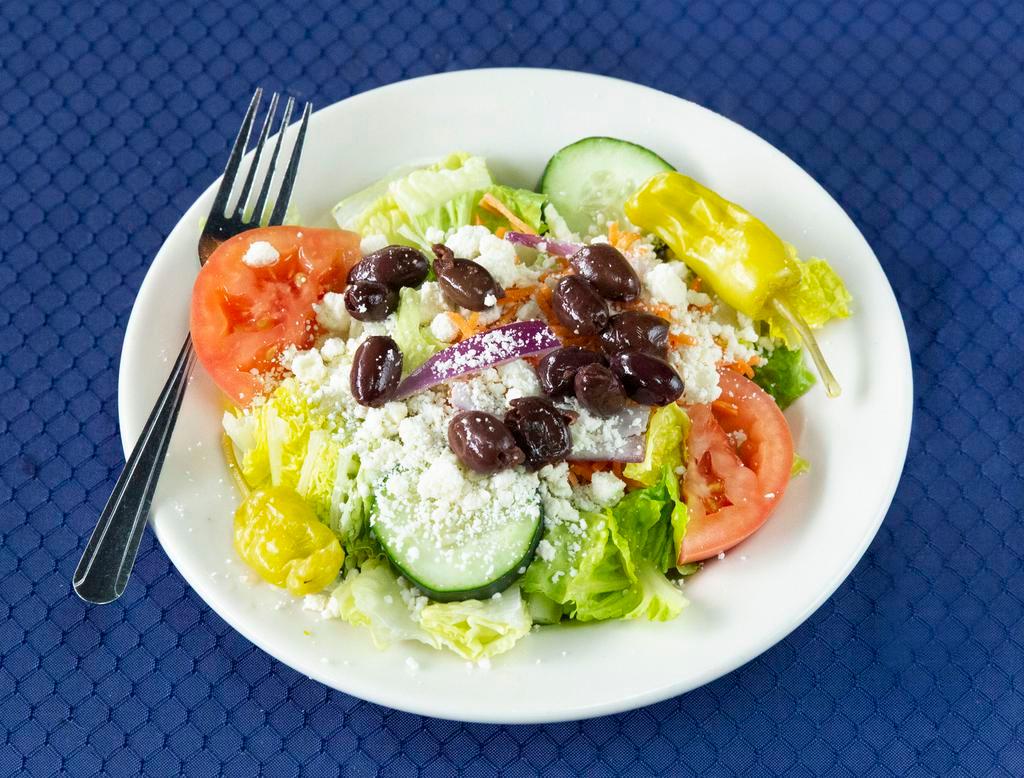 Greek Salad · Romaine lettuce, tomato, carrot, cucumber, feta cheese, Kalamata olive, pepperoncini, Greek dressing and onion.
