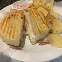 Bellevue Sandwich · Combo of turkey and cranberries. Smoked turkey, onions and Swiss cheese grilled on homemade ...